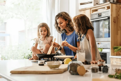 Family cooking together | Hanover Foods